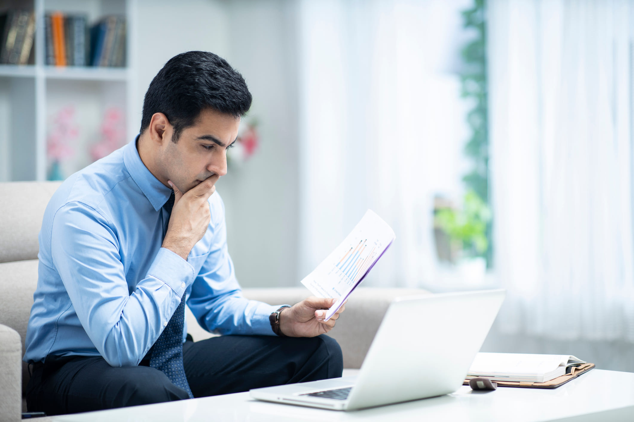 Business man working at home - stock photo